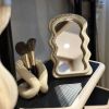 ReflectAura™ Irregular makeup Mirror